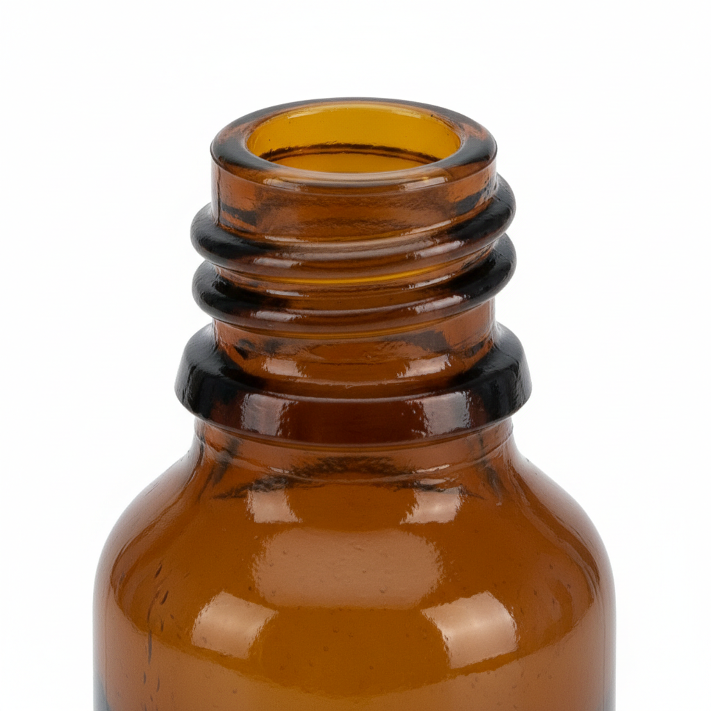 Close-up cierre rosca B.18 envase ámbar 30ml