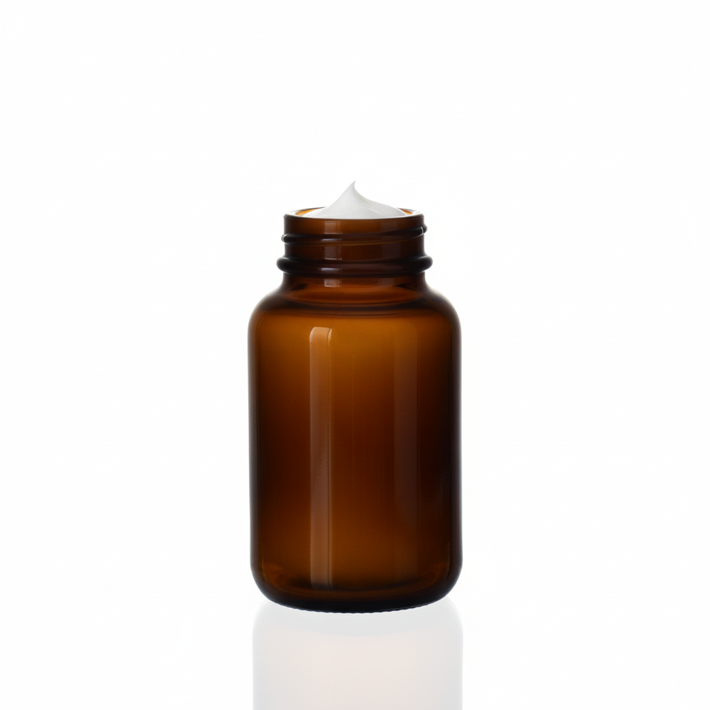 Envase de vidrio ámbar MB120R 120ml con crema blanca, sin etiqueta