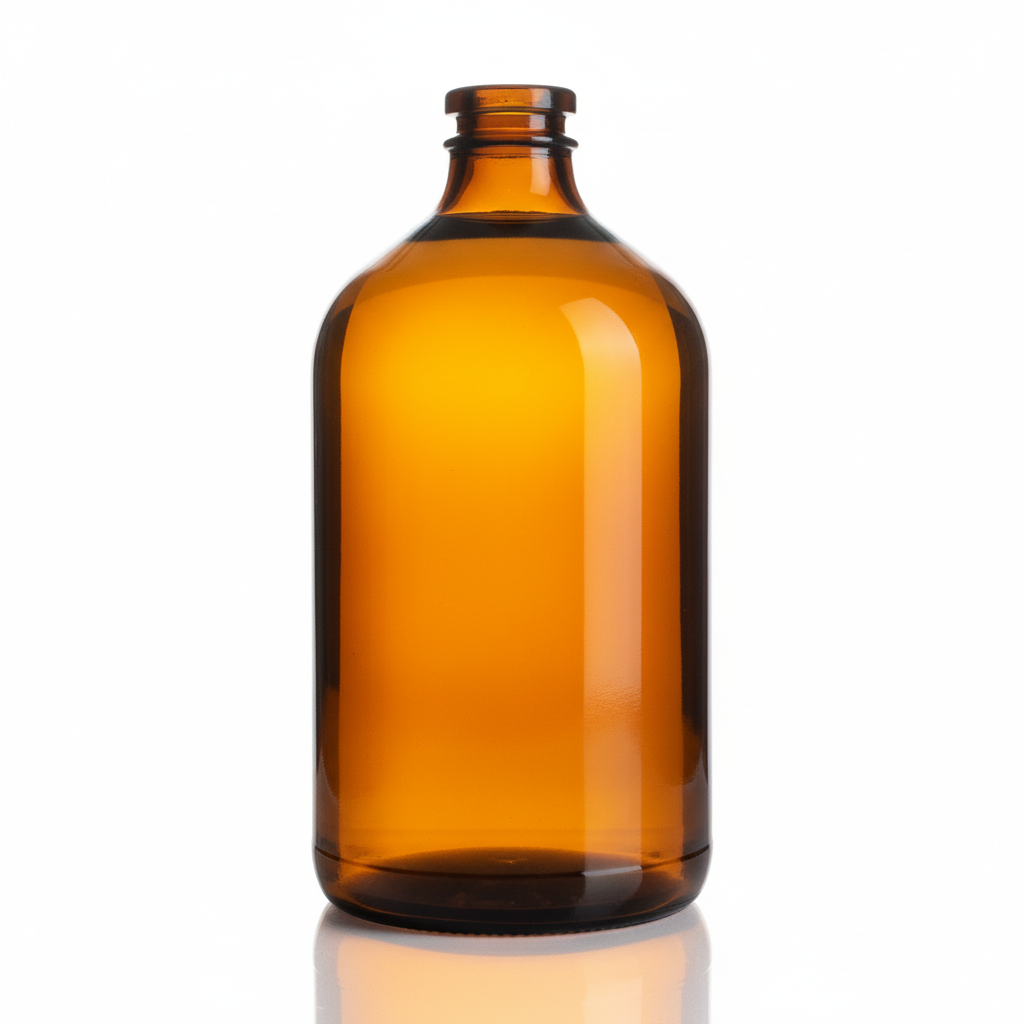 Envase de vidrio ámbar 645ml con licor dorado, sin etiqueta